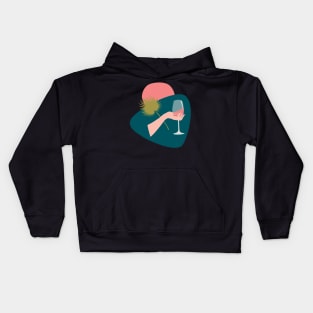 Hand with a glass of rose wine and leaf Kids Hoodie